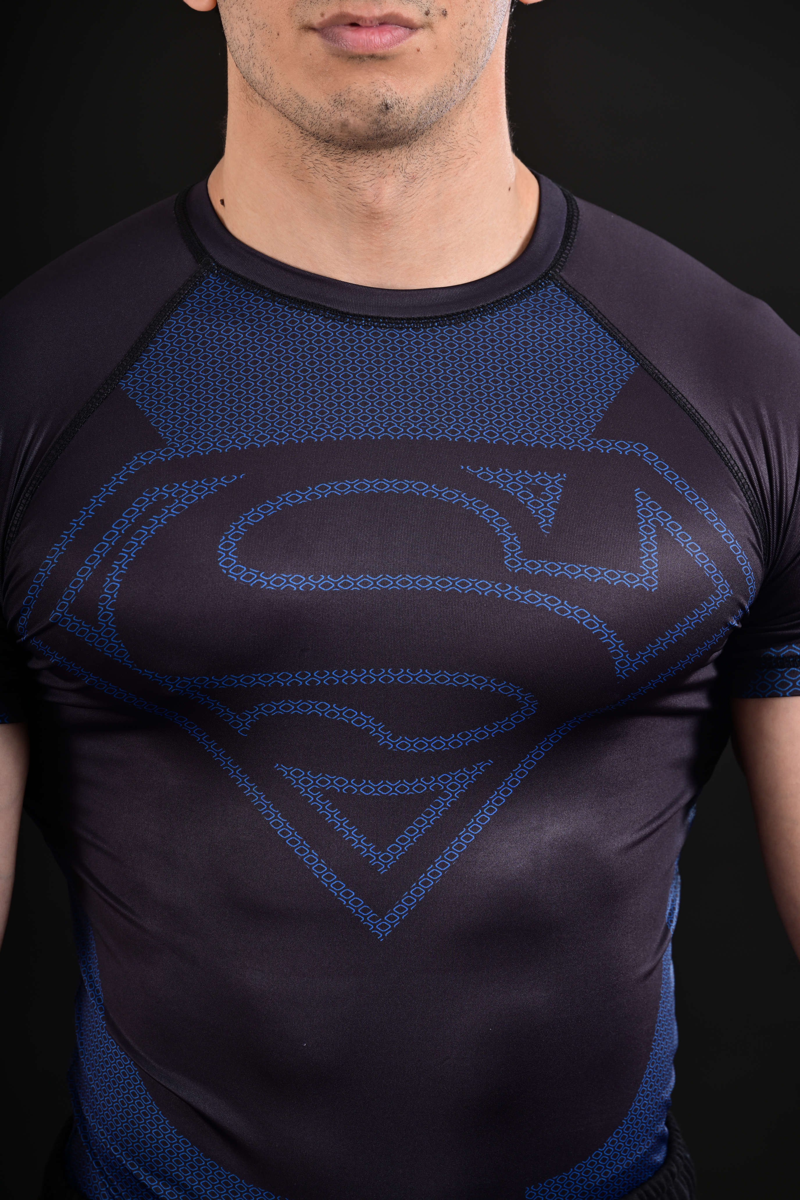 Performance blue Superman athletic shirt training apparel